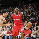 HOUSTON, TX - JANUARY 15: Jamal Crawford #11 of the Los Angeles Clippers drives the ball against Carlos Delfino #10 of the Houston Rockets on January 15, 2013 at the Toyota Center in Houston, Texas. (Photo by Bill Baptist/NBAE via Getty Images)
