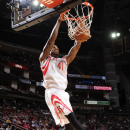 HOUSTON, TX - MARCH 13: Thomas Robinson #41 of the Houston Rockets dunks the ball against the Phoenix Suns on March 13, 2013 at the Toyota Center in Houston, Texas. (Photo by Bill Baptist/NBAE via Getty Images)