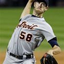 Detroit Tigers starting pitcher Doug Fister delivers during the first inning of a baseball game against the Chicago White Sox, Tuesday, Sept. 11, 2012, in Chicago. (AP Photo/Charles Rex Arbogast)