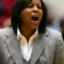 Northern Illinois head coach Carol Owens shouts to her team during the first half of a college basketball game on Saturday, Feb 10, 2007, in DeKalb, Ill. Bowling Green defeated Northern Illinois, 85-76. (AP Photo/Jerry Lai))