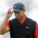 Tiger Woods of the U.S. reacts after his bogey on the first hole during the final round of the 2012 U.S. Open golf tournament on the Lake Course at the Olympic Club in San Francisco, California June 17, 2012. REUTERS/Robert Galbraith