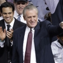 Miami Heat head coach Erik Spoelstra, left, and president Pat Riley celebrate after Game 7 of the NBA basketball championships, Friday, June 21, 2013, in Miami. The Miami Heat defeated the San Antonio Spurs 95-88 to win their second straight NBA championship.(AP Photo/Wilfredo Lee)