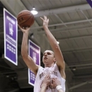 Wisconsin's Jared Berggren shoots over Northwestern's Dave Sobolewski (3) during the first half of an NCAA college basketball game, Wednesday, Feb. 20, 2013, in Evanston, Ill. (AP Photo/Charles Rex Arbogast)