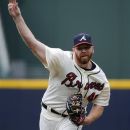 Atlanta Braves pitcher Tommy Hanson delivers to the Washington Nationals during the first inning of a baseball game Saturday, Sept. 15, 2012, in Atlanta. (AP Photo/David Tulis)