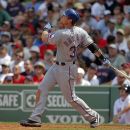 Texas Rangers' Josh Hamilton hits a two-run home run off a pitch by Boston Red Sox's Josh Beckett in the fifth inning of a baseball game at Fenway Park in Boston, Wednesday, Aug. 8, 2012. (AP Photo/Steven Senne)