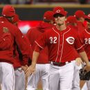 Cincinnati Reds' Jay Bruce (32) is congratulated by teammates after they defeated the Houston Astros 6-0 during a baseball game on Saturday, April 28, 2012, in Cincinnati. The Reds won 6-0. (AP Photo/David Kohl)