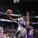 CHARLOTTE, NC - FEBRUARY 8:  Michael Kidd-Gilchrist #14 of the Charlotte Bobcats goes in for a layup against Kobe Bryant #24 of the Los Angeles Lakers on February 8, 2013 at the Time Warner Cable Arena in Charlotte, North Carolina.  (Photo by Andrew D. Bernstein/NBAE via Getty Images)