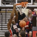 UNLV forward Anthony Bennett (15) slams home a basket against San Diego State during the first half of an NCAA college basketball game on Wednesday Jan. 16, 2013 in San Diego. (AP Photo/Lenny Ignelzi)