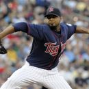 Minnesota Twins pitcher Francisco Liriano throws against the Chicago White Sox in the first inning of a baseball game, Monday, June 25, 2012, in Minneapolis. (AP Photo/Jim Mone)