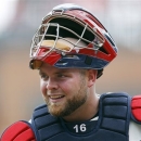 FILE - In this July 15, 2012, file photo, Atlanta Braves catcher Brian McCann looks on during a baseball game against the New York Mets in Atlanta. McCann's status for the start of the 2013 season could be in question following surgery to repair a tear in his labrum that was bigger than expected. The team is still expected to pick up its $12 million option on the six-time All-Star, but it could need to look for help at the position in case McCann's recovery takes longer than expected. (AP Photo/John Bazemore, File)