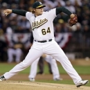 Oakland Athletics pitcher A.J. Griffin delivers in the first inning of Game 4 of their American League division baseball series against the Detroit Tigers in Oakland, Calif., Wednesday, Oct. 10, 2012. (AP Photo/Marcio Jose Sanchez)