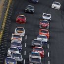 Drivers make their way out of turn four to start the NASCAR Sprint Cup Series Sprint Showdown auto race in Concord, N.C., Saturday, May 19, 2012. (AP Photo/Gerry Broome)