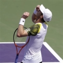 Andy Murray, of Britain, drops his racket after defeating David Ferrer, of Spain, during the final of the Sony Open tennis tournament, Sunday, March 31, 2013, in Key Biscayne, Fla. Murray won 2-6, 6-4, 7-6 (6-1). (AP Photo/Lynne Sladky)