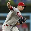 Philadelphia Phillies starting pitcher Roy Halladay delivers against the Los Angeles Dodgers during the first inning of their baseball game in Los Angeles, Tuesday, July 17, 2012. (AP Photo/Alex Gallardo)