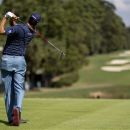 Matt Kuchar tees of the 10th hole during the second round of the Tour Championship golf tournament on Friday, Sept. 21, 2012, in Atlanta. (AP Photo/David Goldman)