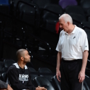 SAN ANTONIO, TX - JUNE 12: Gregg Popovich, head coach of the San Antonio Spurs and Tony Parker view practice as part of the 2013 NBA Finals on June 12, 2013 at AT&T Center in San Antonio, Texas. (Photo by Garrett Ellwood/NBAE via Getty Images)