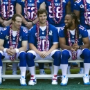 New Orleans Saints quarterback Drew Brees, left,, New York Giants quarterback Eli Manning, center, and Arizona Cardinals wide receiver Larry Fitzgerald (11) share a laugh before the NFC team photo at the NFL Football Pro Bowl in Kapolei, Hawaii, Friday, Jan. 25, 2013. (AP Photo/Marco Garcia)
