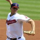 Cleveland Indians' Justin Masterson pitches in the second inning of a baseball game against the Minnesota Twins, Wednesday, Aug. 8, 2012, in Cleveland. (AP Photo/Tony Dejak)