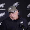 Philadelphia Eagles head coach Chip Kelly listens to a question from a reporter during a news conference before organized team activities at the NFL football team's practice facility, Thursday, May 28, 2015, in Philadelphia. (AP Photo/Matt Slocum)