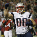 New England Patriots tight end Matthew Mulligan celebrates his touchdown against the Atlanta Falcons during the first half of an NFL football game, Sunday, Sept. 29, 2013, in Atlanta. (AP Photo/David Goldman)