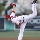 Los Angeles Angels pitcher C. J. Wilson delivers a pitch in the first inning of a baseball game against the Toronto Blue Jays in Anaheim, Calif.,  on Saturday May 5, 2012. (AP Photo/Christine Cotter)