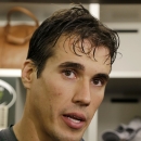 New quarterback Brady Quinn answers a question after New York Jets football practice in Florham Park, N.J., Monday, Sept. 2, 2013. (AP Photo/Mel Evans)