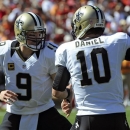 New Orleans Saints quarterback Drew Brees (9) celebrates with backup quarterback Chase Daniel (10) after throwing a touchdown pass to tight end David Thomas against the Tampa Bay Buccaneers during the second quarter of an NFL football game on Sunday, Oct. 21, 2012, in Tampa, Fla. (AP Photo/Brian Blanco)
