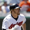 Cleveland Indians' Mark Reynolds runs out a two-run home run off Oakland Athletics relief pitcher Evan Scribner in the fifth inning of a baseball game, Thursday, May 9, 2013, in Cleveland. (AP Photo/Mark Duncan)