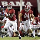 Alabama running back T.J. Yeldon (4) breaks for a 68-yard touchdown in the third quarter against Mississippi in an NCAA college football game in Tuscaloosa, Ala., Saturday, Sept. 28, 2013. (AP Photo/Tuscaloosa News, Dusty Compton)