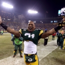 GREEN BAY, WI - JANUARY 05:  Safety Charles Woodson #21 of the Green Bay Packers celebrates after the Packers 24-10 victory against the Minnesota Vikings in the NFC Wild Card Playoff game at Lambeau Field on January 5, 2013 in Green Bay, Wisconsin.  (Photo by Andy Lyons/Getty Images)