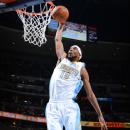 DENVER, CO - DECEMBER 26: Corey Brewer #13 of the Denver Nuggets rises for a dunk against the Los Angeles Lakers on December 26, 2012 at the Pepsi Center in Denver, Colorado. (Photo by Garrett W. Ellwood/NBAE via Getty Images)