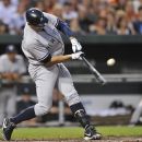New York Yankees' Alex Rodriguez connects for a single against the Baltimore Orioles in the second inning of a baseball game Friday, Sept. 7, 2012, in Baltimore. The Yankees won 8-5. (AP Photo/Gail Burton)