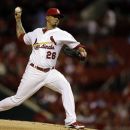 St. Louis Cardinals starting pitcher Kyle Lohse throws during the first inning of a baseball game against the Houston Astros, Tuesday, Sept. 18, 2012, in St. Louis. (AP Photo/Jeff Roberson)