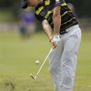 Rory McIlroy, of Northern Ireland, hits from the seventh fairway at the St. Jude Classic golf tournament on Saturday, June 9, 2012, in Memphis, Tenn. (AP Photo/Mark Humphrey)