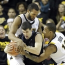 Butler guard Alex Barlow (3) is trapped by Virginia Commonwealth center D.J. Haley, left, and guard Darius Theus (10) during the second half of an NCAA college basketball game in Richmond, Va., Saturday, March 2, 2013. VCU won 84-52. (AP Photo/Steve Helber)