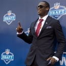 West Virginia's Geno Smith waves to fans on the red carpet before the first round of the NFL football draft, Thursday, April 25, 2013, at Radio City Music Hall in New York. (AP Photo/Craig Ruttle)