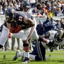Chicago Bears running back Michael Bush (29) rushes for a touchdown past St. Louis Rams linebacker Jo-Lonn Dunbar (58) in the first half of an NFL football game in Chicago, Sunday, Sept. 23, 2012. (AP Photo/Nam Y. Huh)