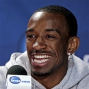 Louisville's Russ Smith laughs during a news conference for their NCAA Final Four tournament college basketball game Sunday, April 7, 2013, in Atlanta. Louisville plays Michigan in the championship game on Monday. (AP Photo/Chris O'Meara)