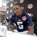 Notre Dame quarterback Everett Golson answers a question during Media Day for the BCS National Championship college football game Saturday, Jan. 5, 2013, in Miami. Notre Dame faces Alabama in Monday's championship game.(AP Photo/Chris O'Meara)