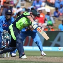 William Porterfield, pictured batting against India, believes a lack of exposure against bigger teams is hurting Ireland after they lose by eight wickets to the defending world champions (AFP Photo/Michael Bradley)