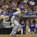 Los Angeles Dodgers' Luis Cruz watches his two run single head into center field during the Dodgers' four fifth inning against the San Diego Padres during a baseball game Thursday, Sept. 27, 2012 in San Diego. (AP Photo/Lenny Ignelzi)