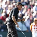 Phil Mickelson pumps his fist after making birdie on the 16th hole during the first round of the Waste Management Phoenix Open golf tournament Thursday, Jan. 31, 2013, in Scottsdale, Ariz. (AP Photo/Ross D. Franklin)