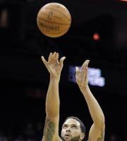 New Jersey Nets ' Deron Williams shoots during the first quarter of an NBA basketball game against the Charlotte Bobcats , Sunday, Jan. 22, 2012, in Newark, N.J. The Nets won 97-87.