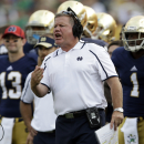 Notre Dame head coach Brian Kelly yells to his team during the second half of an NCAA college football game against Temple in South Bend, Ind., Saturday, Aug. 31, 2013. Notre Dame defeated Temple 28-6. (AP Photo/Michael Conroy)