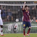 Barcelona's Lionel Messi, right, celebrates after scoring his second goal during the Champions League group H soccer match between FC Barcelona and AC Milan, at the Camp Nou stadium, in Barcelona, Spain, Wednesday, Nov. 6, 2013. (AP Photo/Manu Fernandez)
