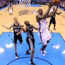 OKLAHOMA CITY, OK - MAY 31: Serge Ibaka #9 of the Oklahoma City Thunder goes up for a shot against James Anderson #25 of the San Antonio Spurs in Game Five of the Western Conference Finals of the 2012 NBA Playoffs at Chesapeake Energy Arena on May 31, 2012 in Oklahoma City, Oklahoma. (Photo by Ronald Martinez/Getty Images)