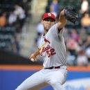 St. Louis Cardinals starting pitcher Michael Wacha throws against the New York Mets in the first inning of a baseball game at Citi Field on Tuesday, June 11, 2013 in New York. (AP Photo/Kathy Kmonicek)