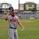 Altanta Braves Chipper Jones walks to the dugout after presenting the lineup card before a baseball game against the Pittsburgh Pirates at PNC Park in Pittsburgh Wednesday, Oct. 3, 2012. (AP Photo/Gene J. Puskar)