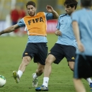 Spain's Sergio Ramos, left, and Javier Martinez, right, vie for the ball during a training session at Maracana stadium in Rio de Janeiro, Brazil, Saturday, June 29, 2013. Spain will face Brazil on Sunday for the final match. (AP Photo/Victor R. Caivano)