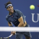 Rafael Nadal, of Spain, serves against Rogerio Dutra Silva, of Brazil, during the second round of the 2013 U.S. Open tennis tournament, Thursday, Aug. 29, 2013, in New York. (AP Photo/Charles Krupa)